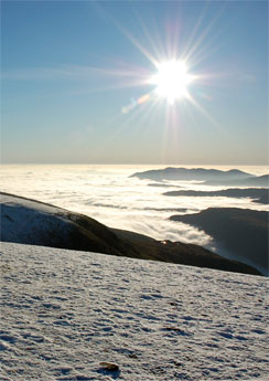 Spectacular cloud inversion - Helvellyn summit plateau on a sunny winter's day